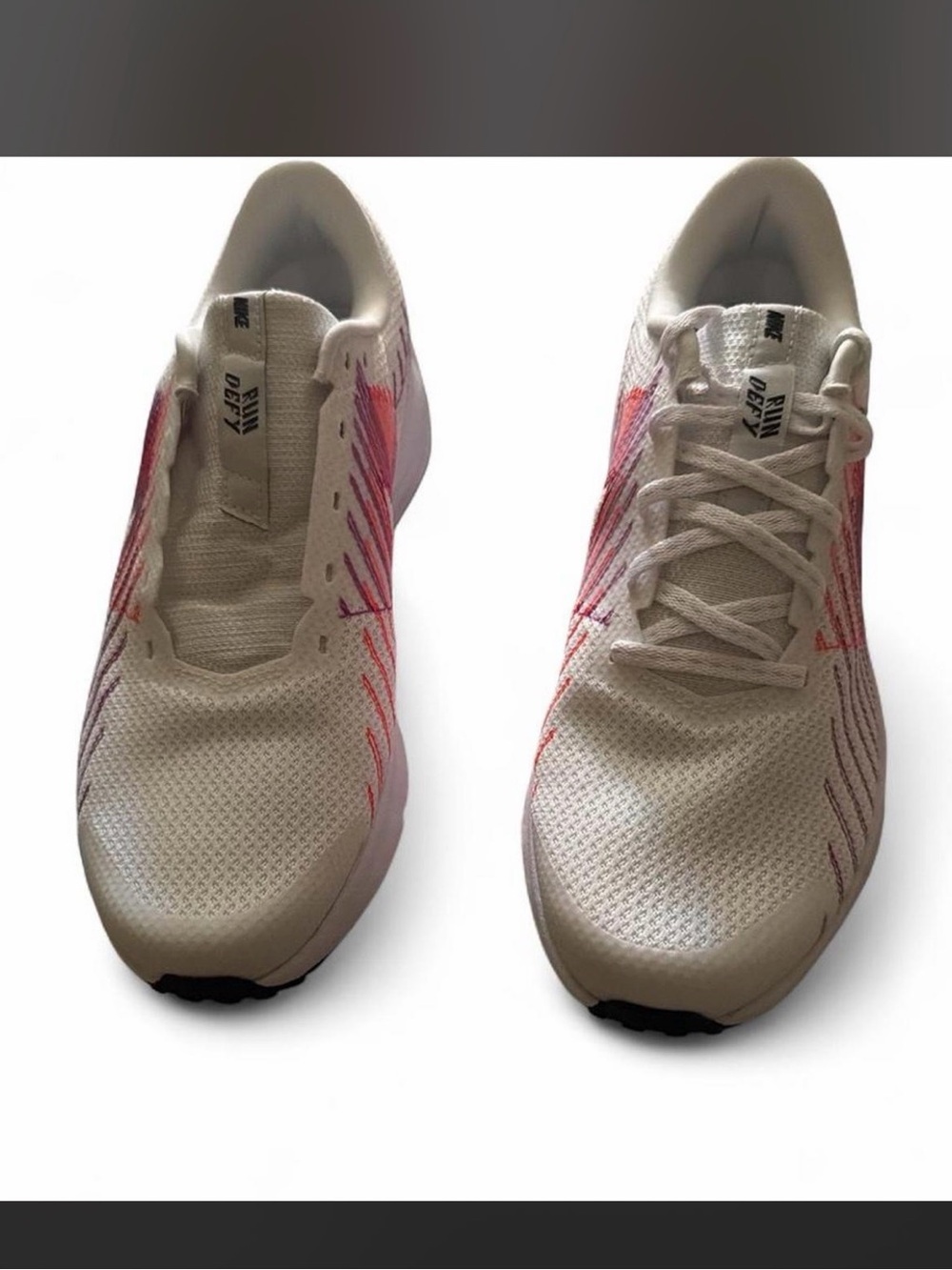 Nike Women's White Running Shoes with Pink and Purple Accents